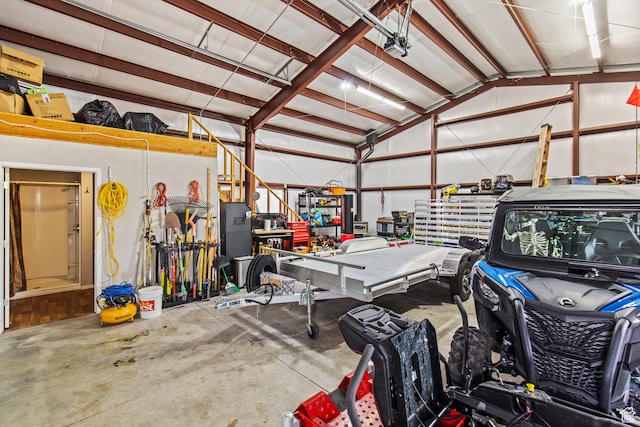 garage with a workshop area