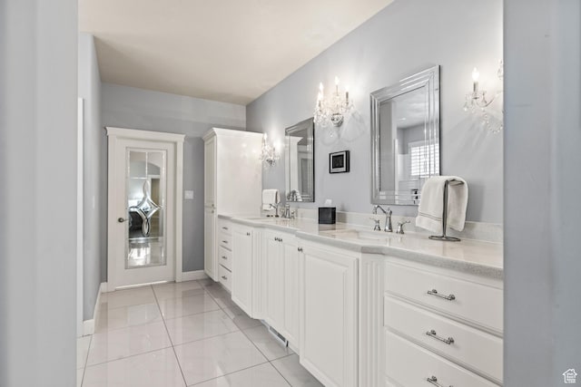 528 E 700 S Unit 4, Monroe, UT 84754 - full bathroom featuring double vanity, baseboards, marble finish floors, and a chandelier