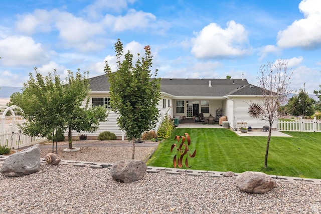 528 E 700 S Unit 4, Monroe, UT 84754 - back of house with a patio area and roof with shingles