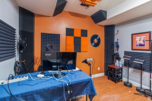 bedroom with hardwood / wood-style flooring