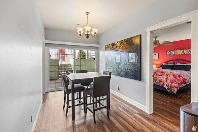 528 E 700 S Unit 4, Monroe, UT 84754 - dining area with wood finished floors, a chandelier, and baseboards