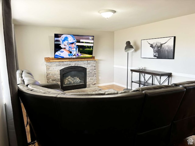 341 S 3rd W, Soda Springs, ID 83276 - living room featuring a fireplace and wood-type flooring
