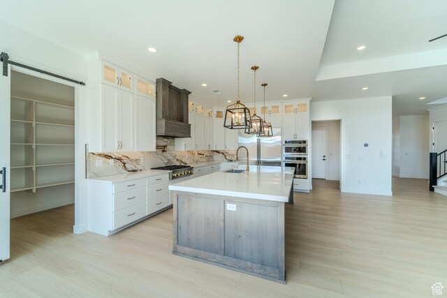 3092 E 2110th St S, St George, UT 84790 - kitchen featuring appliances with stainless steel finishes, a sink, light countertops, recessed lighting, and backsplash