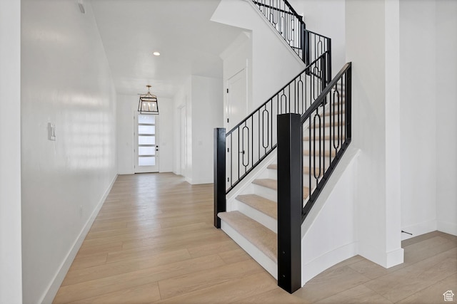 3092 E 2110th St S, St George, UT 84790 - stairway with wood finished floors, a chandelier, and recessed lighting