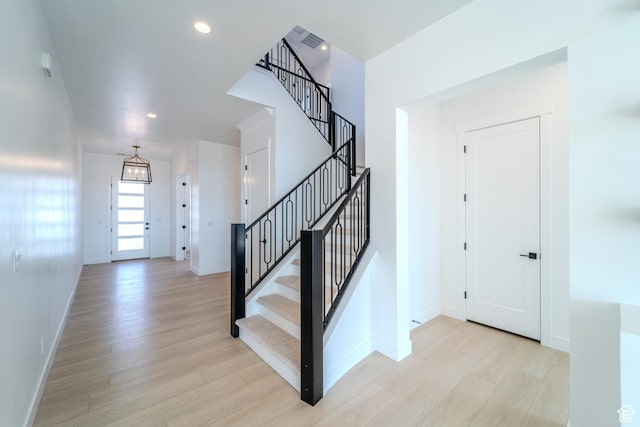 3092 E 2110th St S, St George, UT 84790 - foyer with light wood-style flooring, baseboards, stairway, and recessed lighting
