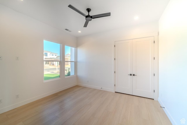 3092 E 2110th St S, St George, UT 84790 - unfurnished bedroom with light wood-style flooring, baseboards, recessed lighting, and a closet