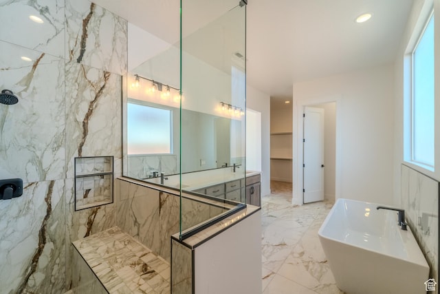 3092 E 2110th St S, St George, UT 84790 - full bath with a marble finish shower, marble tiled floors, a freestanding tub, double vanity, and recessed lighting