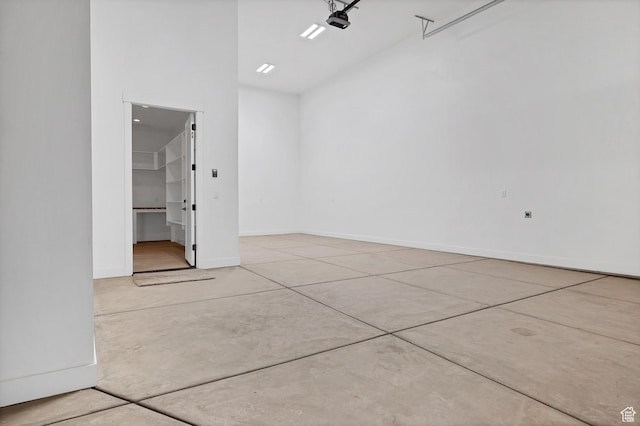 3092 E 2110th St S, St George, UT 84790 - garage with baseboards and a garage door opener