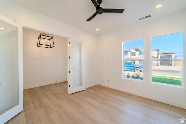 3092 E 2110th St S, St George, UT 84790 - spare room featuring ceiling fan, light wood finished floors, a chandelier, baseboards, and recessed lighting