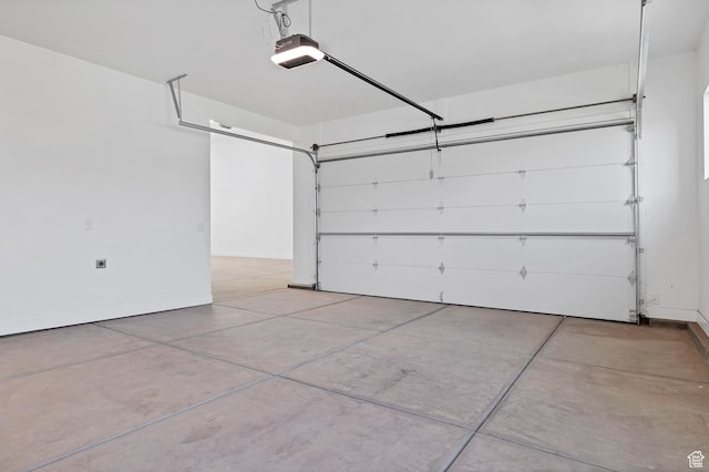 3092 E 2110th St S, St George, UT 84790 - garage with a garage door opener and baseboards