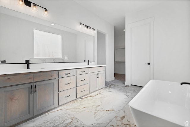 3092 E 2110th St S, St George, UT 84790 - bathroom featuring marble tiled flooring, double vanity, and a soaking tub