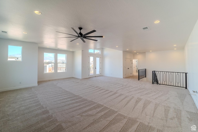 3092 E 2110th St S, St George, UT 84790 - unfurnished living room featuring light colored carpet, recessed lighting, baseboards, and ceiling fan