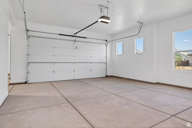 3092 E 2110th St S, St George, UT 84790 - garage featuring a garage door opener and baseboards