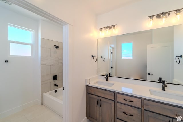 3092 E 2110th St S, St George, UT 84790 - bathroom with double vanity, tile patterned floors, baseboards, and tub / shower combination