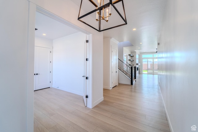 3092 E 2110th St S, St George, UT 84790 - corridor with stairway, baseboards, light wood-type flooring, a chandelier, and recessed lighting