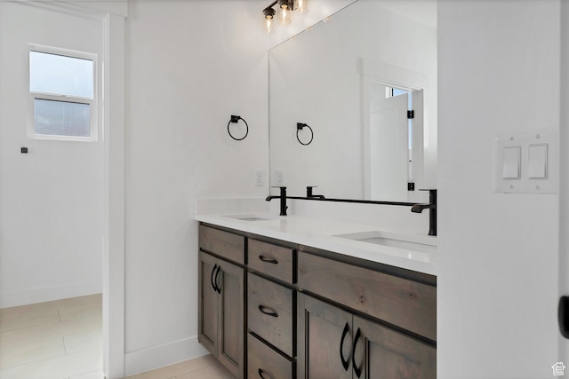 3092 E 2110th St S, St George, UT 84790 - full bathroom featuring double vanity and baseboards