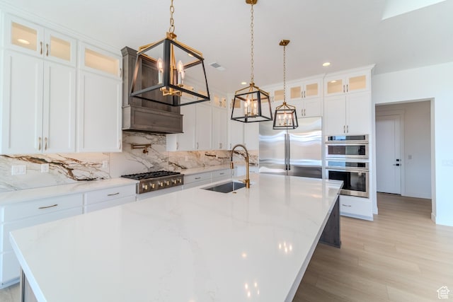 3092 E 2110th St S, St George, UT 84790 - kitchen with stainless steel appliances, a chandelier, a sink, tasteful backsplash, and recessed lighting