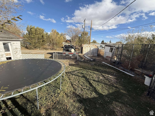 view of yard with a trampoline