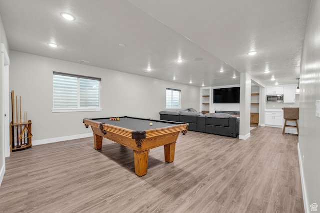 game room featuring light wood-type flooring and pool table
