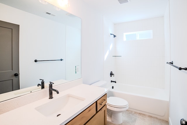 full bathroom with tile patterned flooring, vanity, toilet, and tiled shower / bath