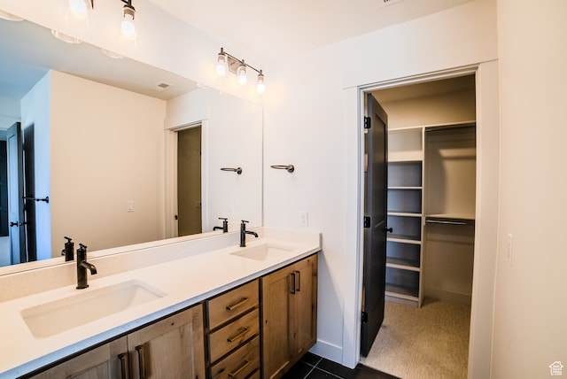 bathroom featuring tile patterned floors and vanity
