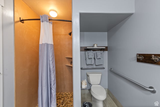 100 W 200 S Unit 103, Moab, UT 84532 - bathroom featuring toilet and walk in shower