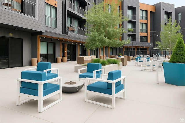 2670 W Canyons Resort Dr Unit 205, Park City, UT 84098 - view of patio featuring an outdoor living space with a fire pit