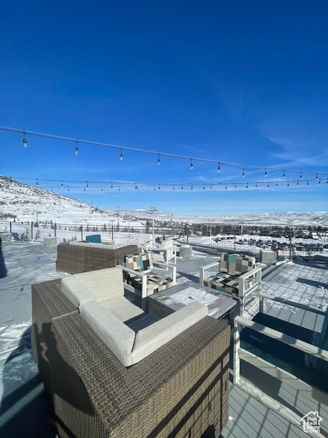 2670 W Canyons Resort Dr Unit 205, Park City, UT 84098 - snow covered deck with outdoor lounge area