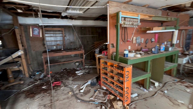 miscellaneous room with a workshop area