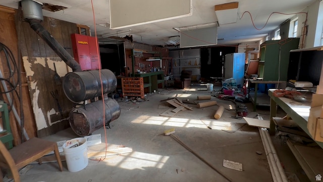 miscellaneous room with a workshop area