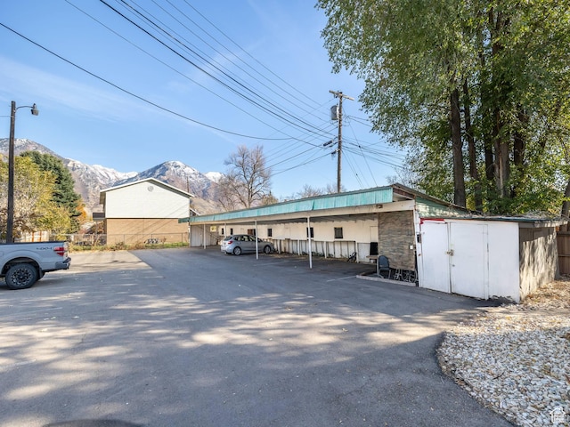 339 S 600 W, Provo, UT 84601 - garage featuring uncovered parking and a mountain view