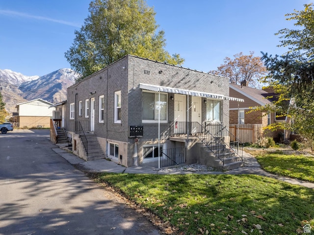 339 S 600 W, Provo, UT 84601 - townhome / multi-family property with a mountain view and brick siding