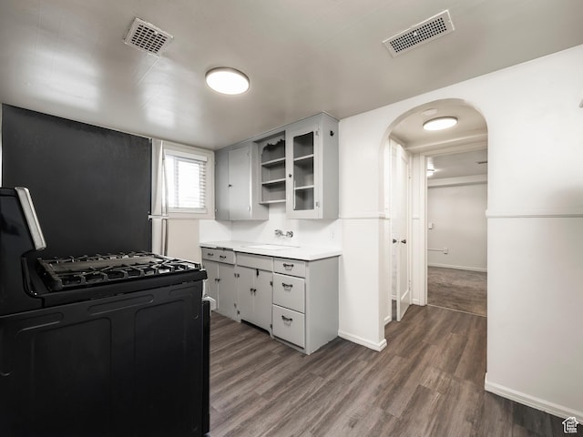 339 S 600 W, Provo, UT 84601 - kitchen with gas range, arched walkways, open shelves, a sink, and light countertops