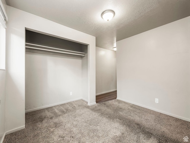 339 S 600 W, Provo, UT 84601 - unfurnished bedroom featuring carpet floors, a textured ceiling, baseboards, and a closet