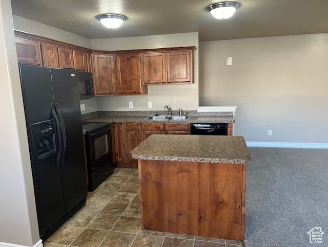 895 S Main St Unit E, Layton, UT 84041 - kitchen featuring black appliances, sink, and dark colored carpet