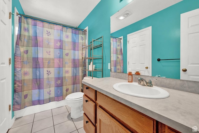 2778 W 5400 S, Roy, UT 84067 - bathroom with vanity, tile patterned flooring, and toilet