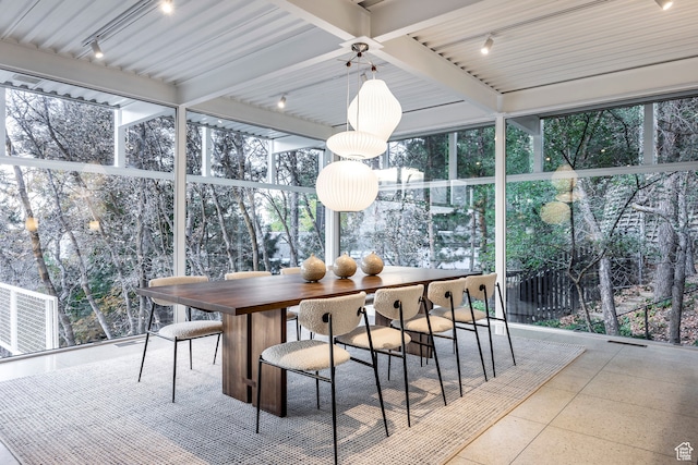 4345 S Zarahemla Dr, Salt Lake City, UT 84124 - sunroom / solarium with beam ceiling, track lighting, and a wealth of natural light