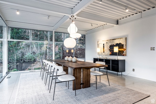 4345 S Zarahemla Dr, Salt Lake City, UT 84124 - dining area featuring beamed ceiling and floor to ceiling windows