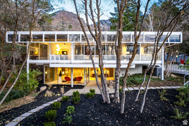 4345 S Zarahemla Dr, Salt Lake City, UT 84124 - rear view of property featuring a mountain view and a patio