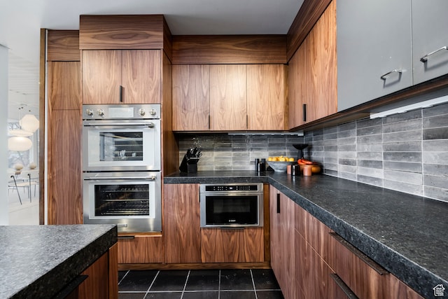 4345 S Zarahemla Dr, Salt Lake City, UT 84124 - kitchen with dark tile patterned flooring, backsplash, and double oven