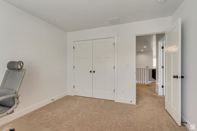 interior space featuring light colored carpet