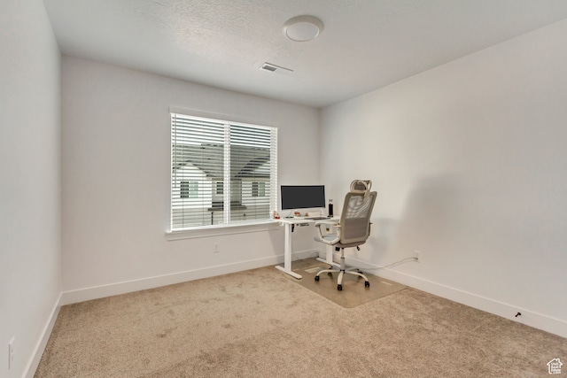 view of carpeted home office