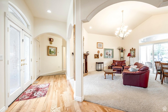 618 E Draper Heights Way S, Draper, UT 84020 - entryway featuring a chandelier, light hardwood / wood-style floors, and lofted ceiling