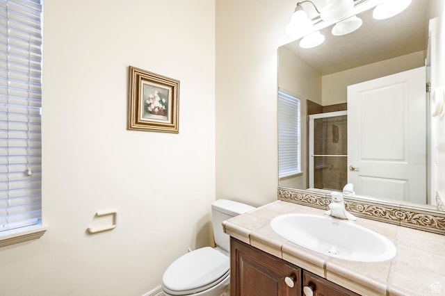 618 E Draper Heights Way S, Draper, UT 84020 - bathroom featuring vanity, toilet, and a shower with door