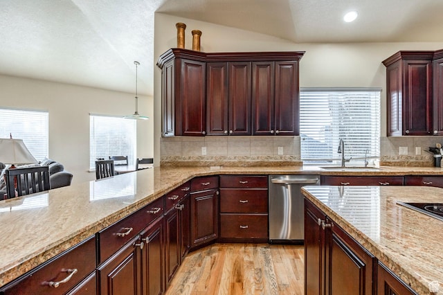 618 E Draper Heights Way S, Draper, UT 84020 - kitchen with decorative backsplash, sink, pendant lighting, dishwasher, and light hardwood / wood-style floors