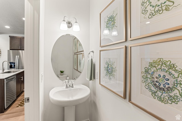 1044 E 1930 S Unit 419, Heber City, UT 84032 - bathroom featuring wood finished floors and recessed lighting