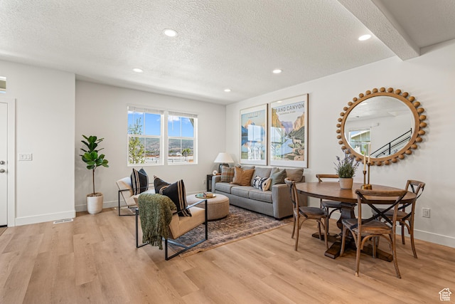 1044 E 1930 S Unit 419, Heber City, UT 84032 - living area featuring light wood-style flooring, a textured ceiling, and recessed lighting