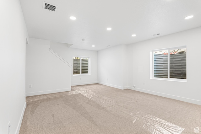 1044 E 1930 S Unit 419, Heber City, UT 84032 - spare room featuring light colored carpet and recessed lighting