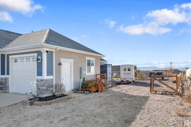 view of home's exterior with a garage