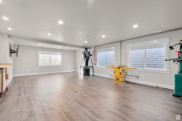 2388 E Horizon Dr Unit 907, Eagle Mountain, UT 84005 - unfurnished living room with recessed lighting, light wood finished floors, and baseboards